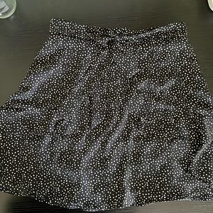 Trendy black & white polka dot ruffle mini skirt with tie bow, Altar’d State